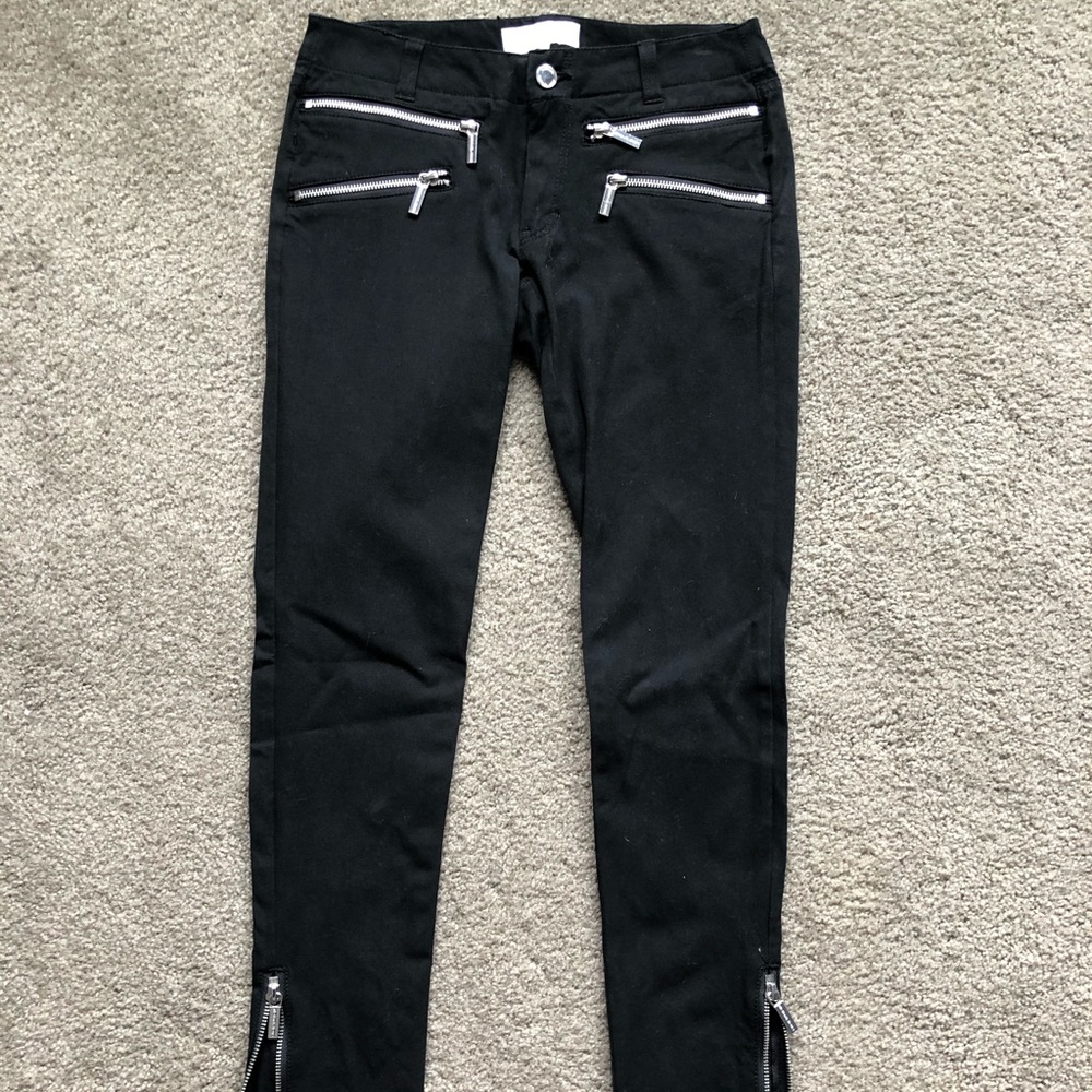 MK black denim with silver zippers